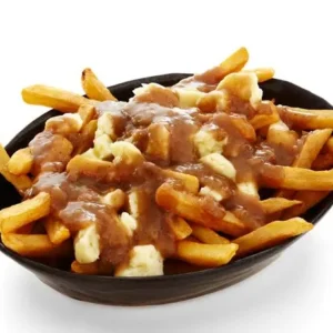 Canadian poutine with fries with melted cheese curd and gravy
