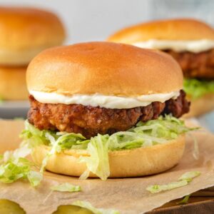 Nashville Hot Burger - Spicy, Smoky and Crispy. Crispy chicken burger smothered in Nashville hot sauce and fresh lettuce and creamy mayo on a soft bun